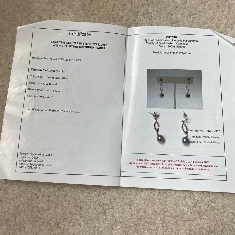 Tahitian pearl earrings.